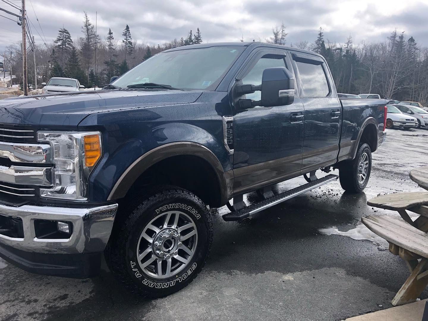Deep-blue Ford F-350 repaired and repainted